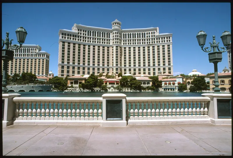 Bellagio's curved hotel tower and lake from the Las Vegas Strip in 2005.