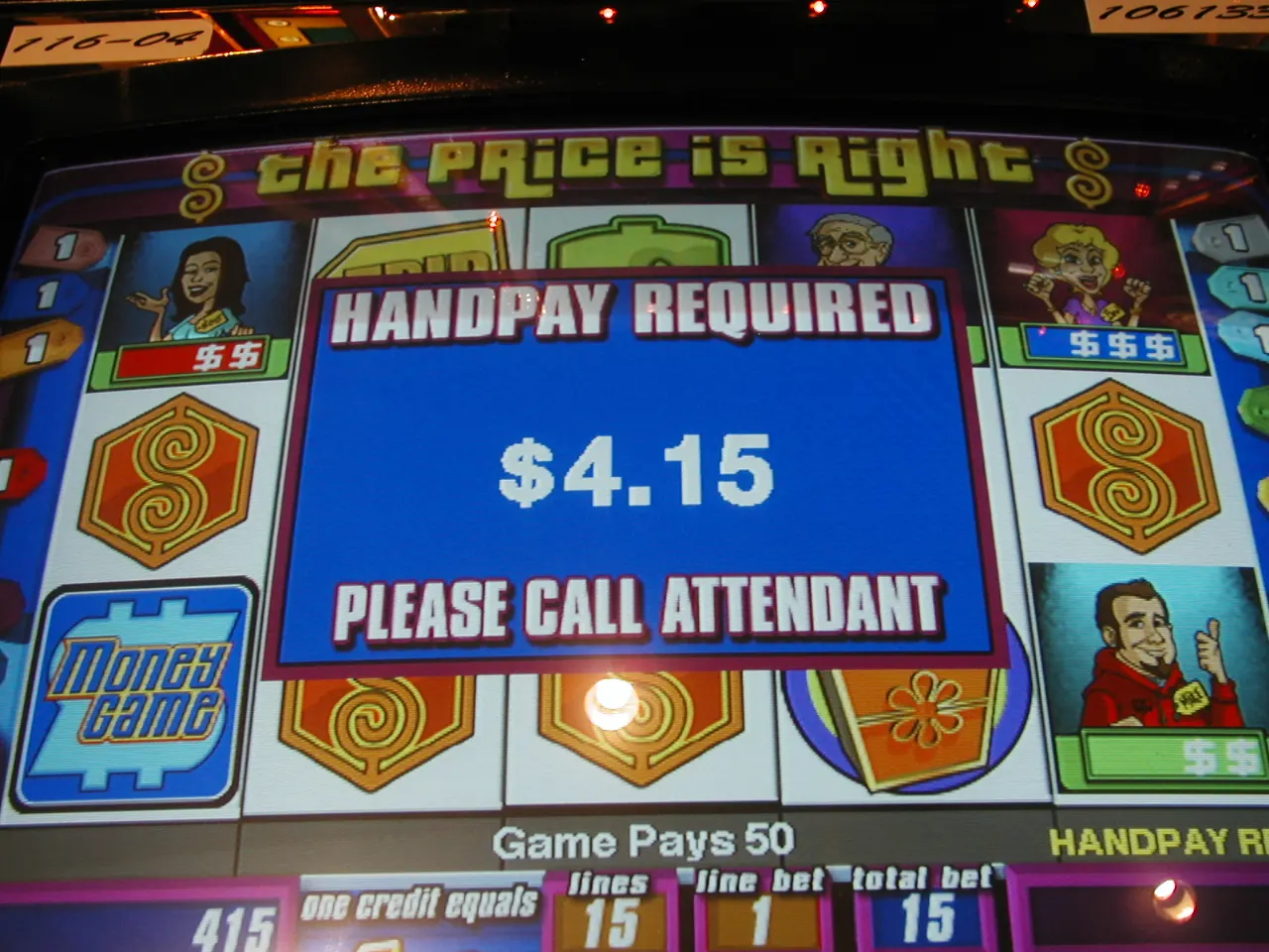 A Price Is Right penny slot screen reading Handpay Required, $4.15, Please Call Attendant.