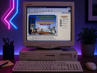A beige late-1990s Compaq CRT computer on a night-lit desk, its Netscape browser showing the Boardwalk Hotel and Casino 'wish you were here' homepage.
