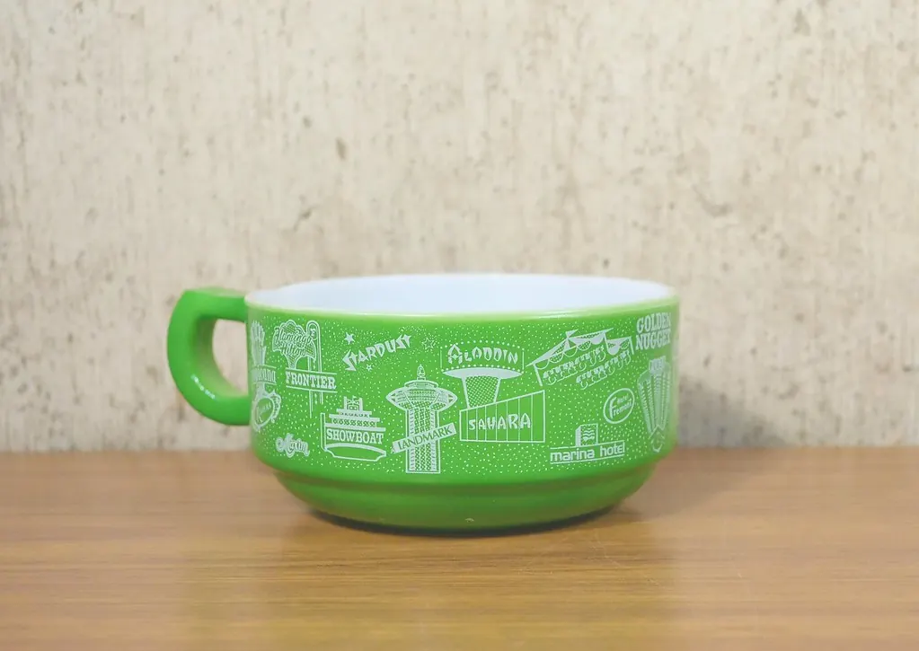 Vintage green handled soup mug printed with Las Vegas landmarks.