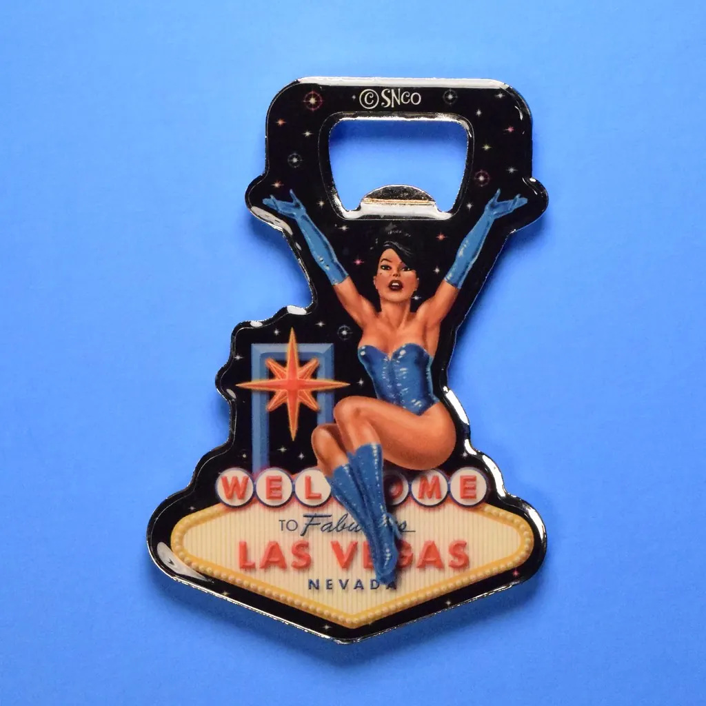 Welcome to Las Vegas bottle-opener magnet with a seated pin-up showgirl.