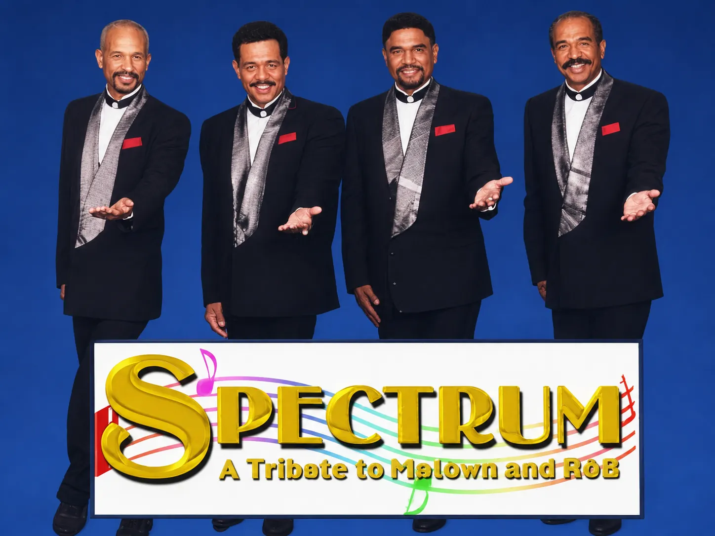 Spectrum with four performers in matching grey suits and red pocket squares above the complete show logo.